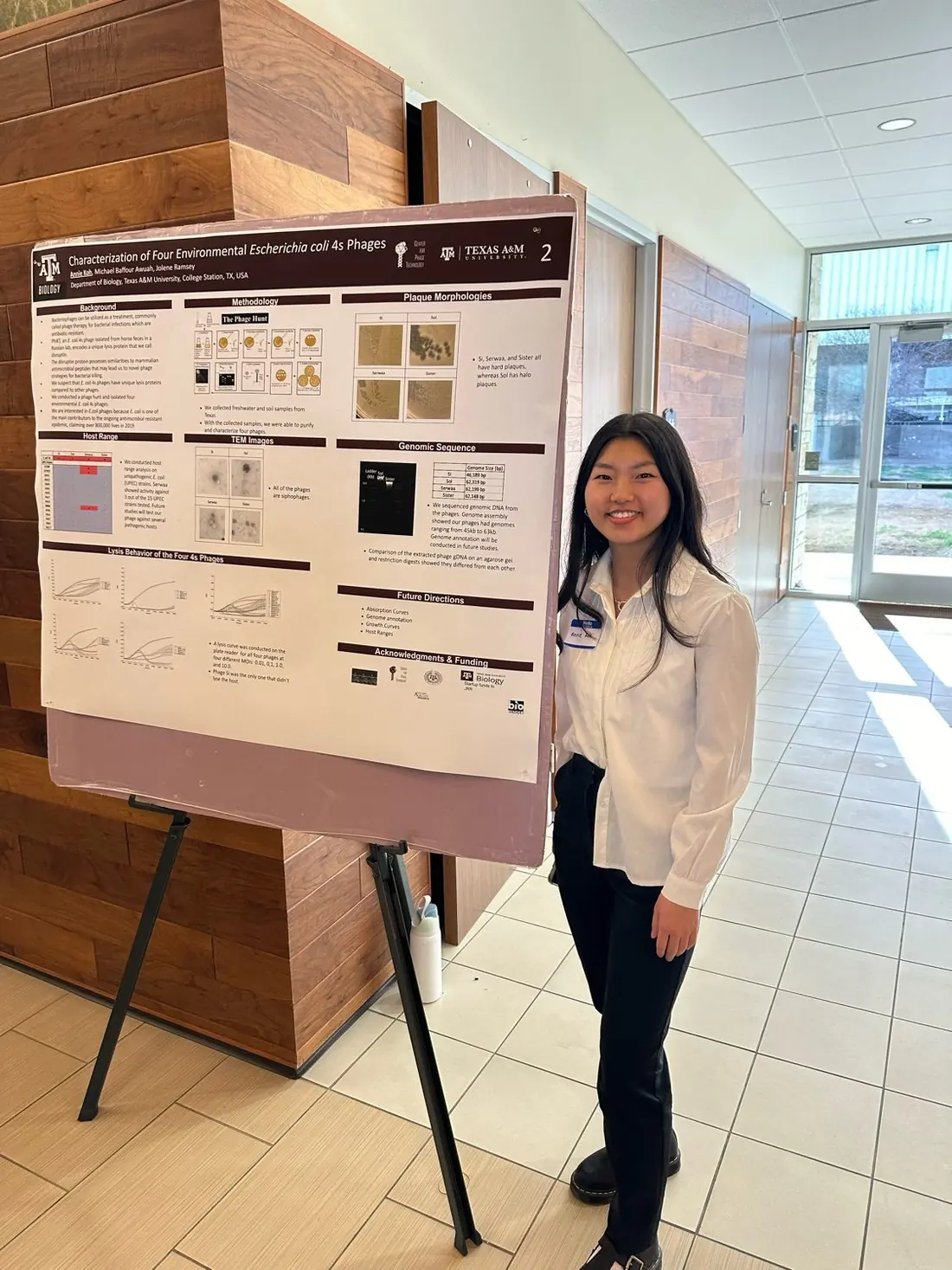 Annie Koh presenting a scientific poster titled 'Characterization of Four Environmental Escherichia coli 4s Phages' at Texas A&M University