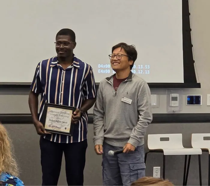 Michael Baffour Awuah receiving the Thomas L. Patterson Graduate Student Fellowship